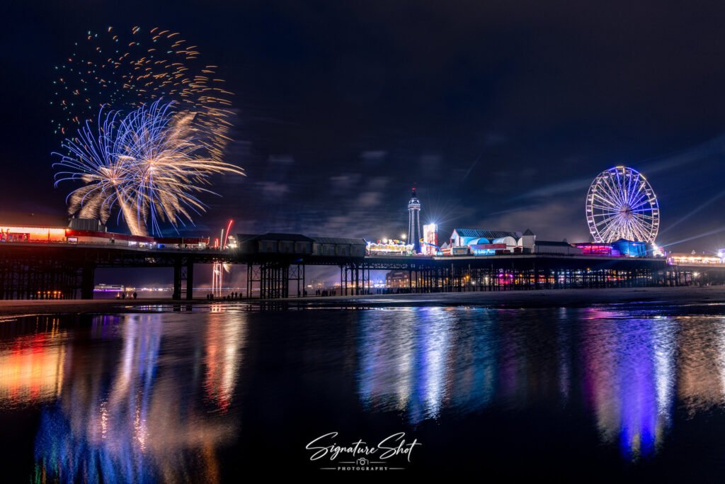 Wales fireworks display over Blackpool seafront with Blackpool Tower and Central Pier during the 2026 World Fireworks Championship.