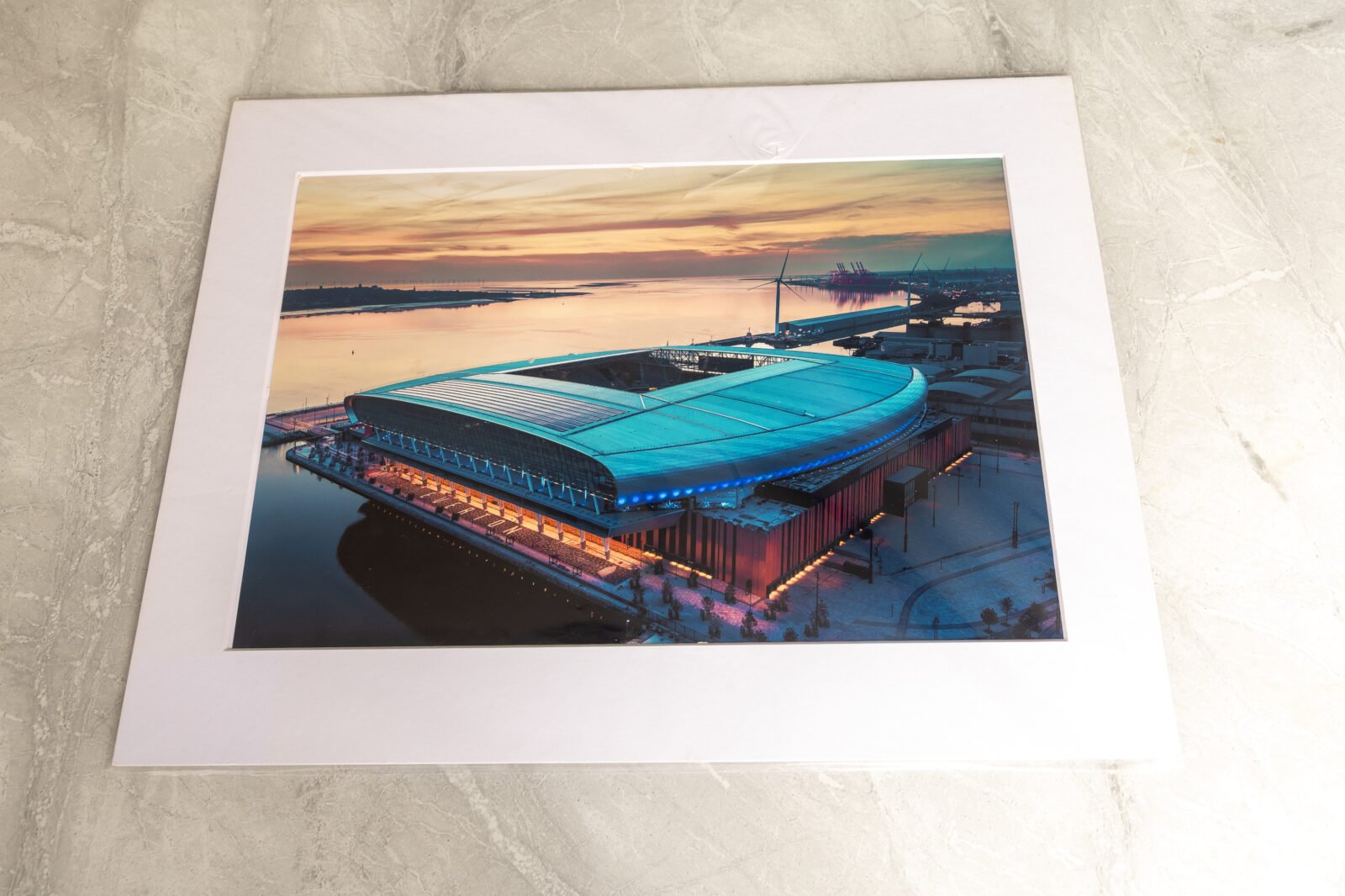 Aerial photograph of Hill Dickinson Stadium on Liverpool’s waterfront at sunset, presented as an A3 mounted photography print.