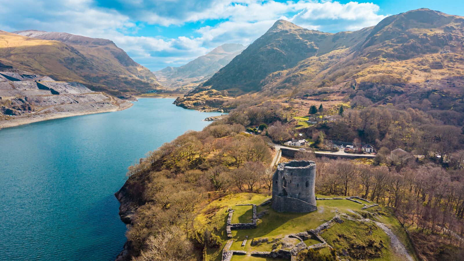 Aerial view of Dolbadarn Castle overlooking Llyn Peris and the mountains surrounding Llanberis in Eryri Snowdonia, North Wales
